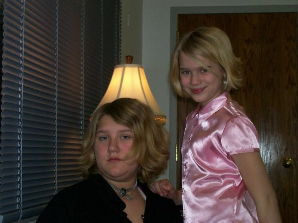 Sisters making dinner together after their performance